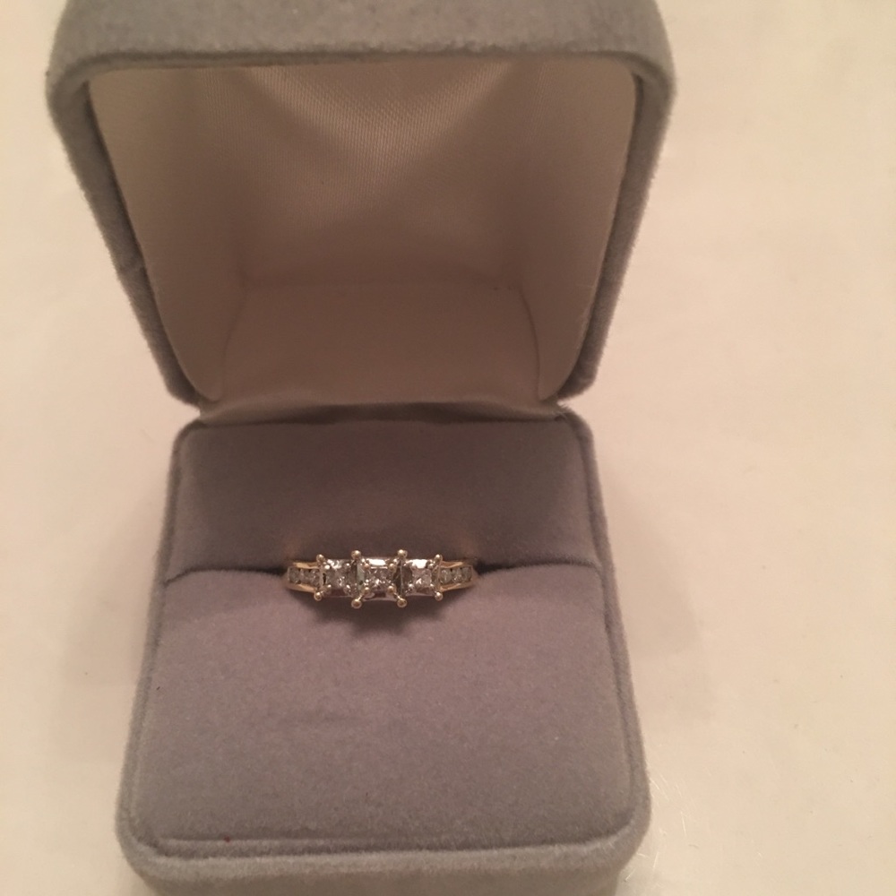 14 Karat Gold Engagement Ring, $450